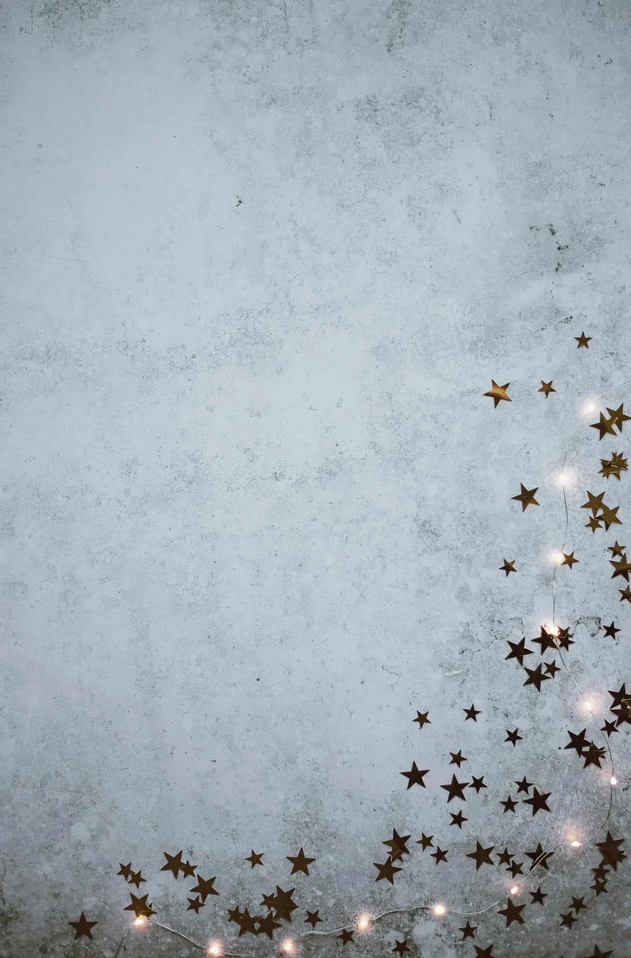 Gold star confetti fairy lights flatlay
