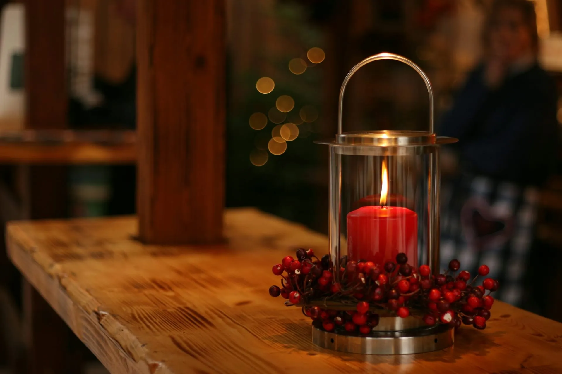 Holiday candle lantern red berries rustic