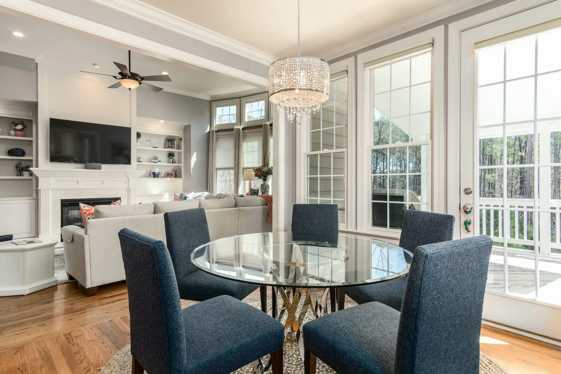 Real estate interior dining room glass table navy