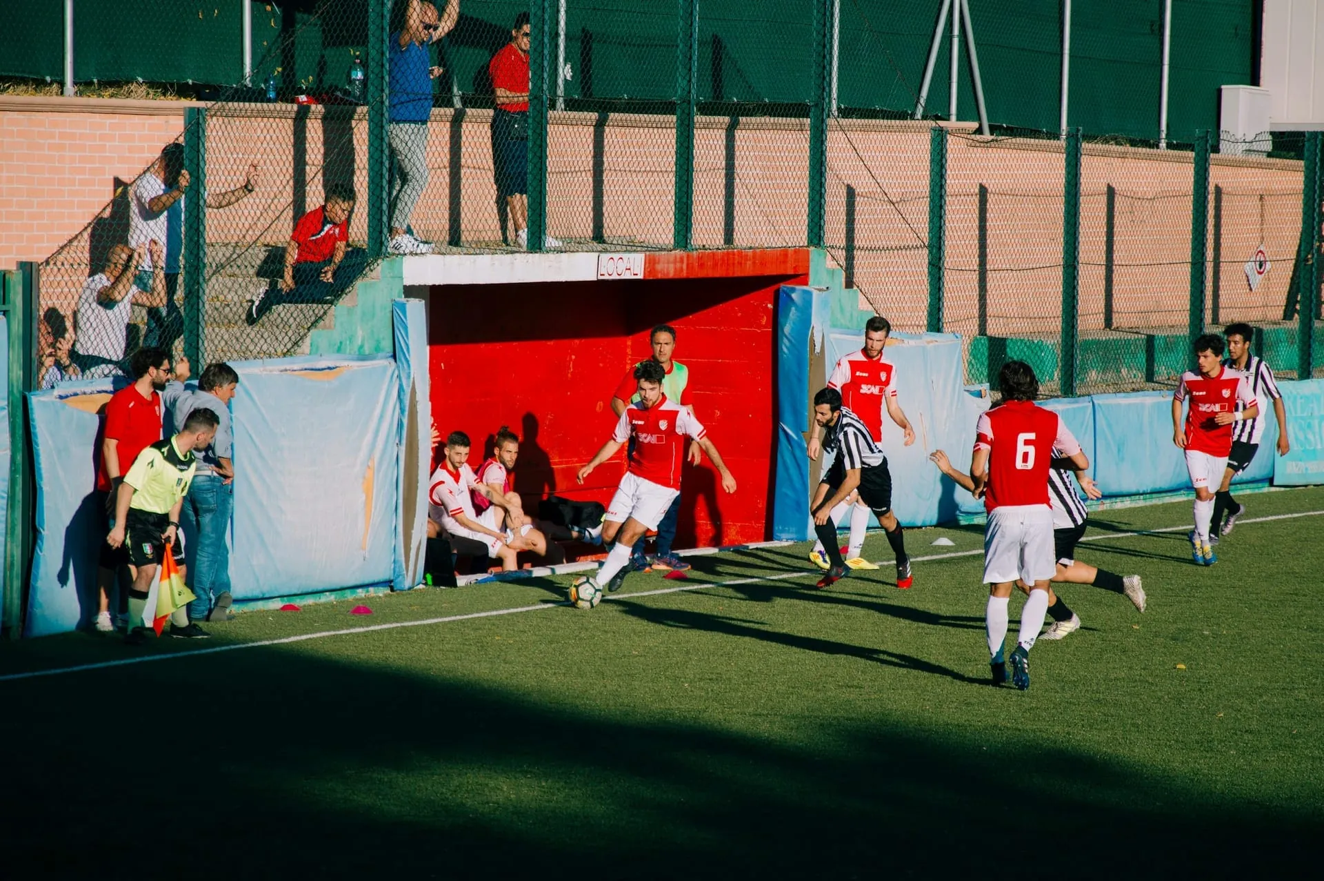 Soccer youth match dugout action celebration