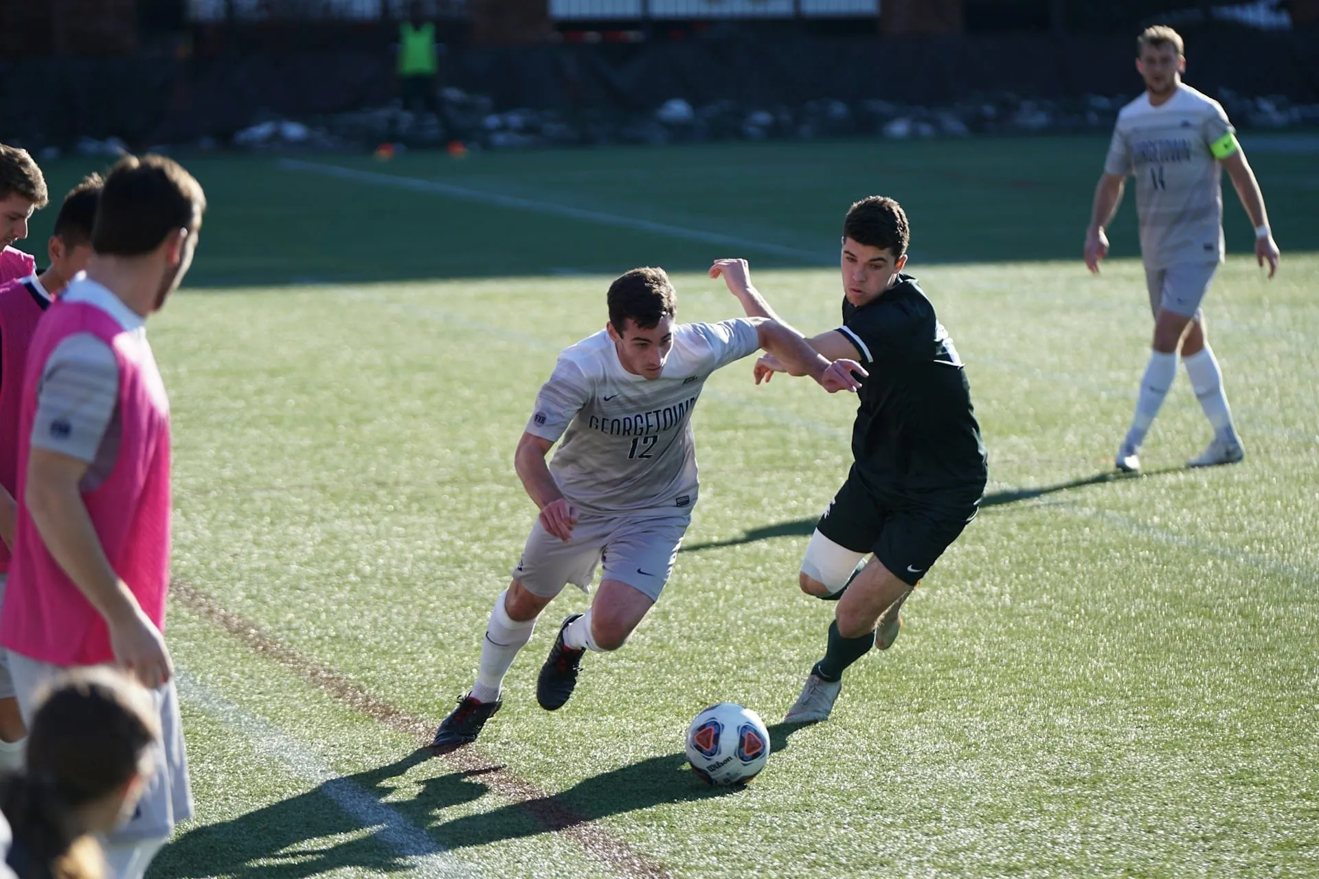 Youth soccer match action turf daytime
